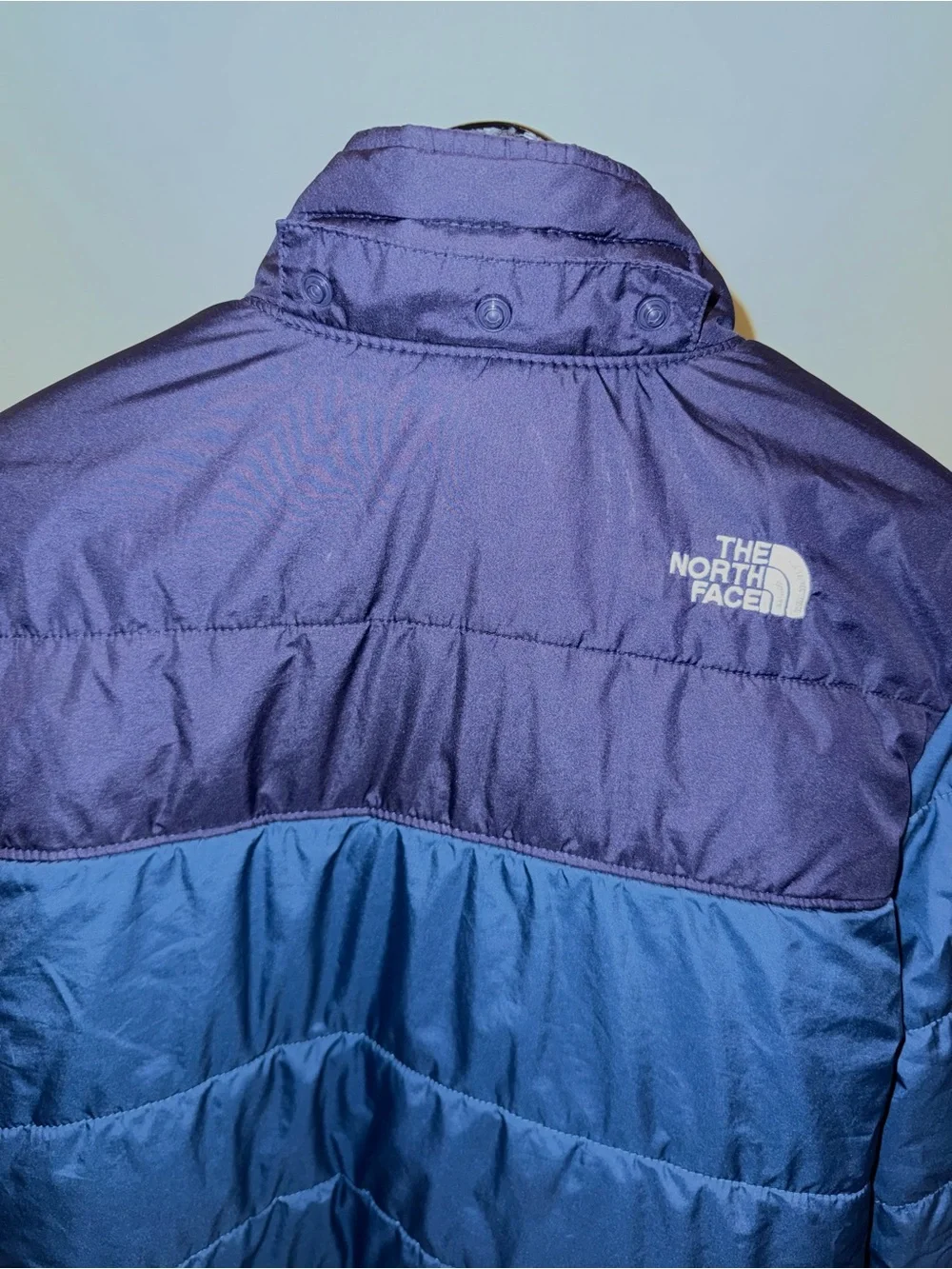 The North Face reversible puffer jacket with a soft, fleece lining, size 14/16